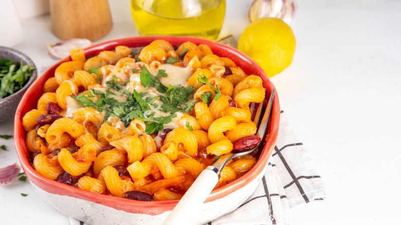 bowl of beef and macaroni in a dish with a fork