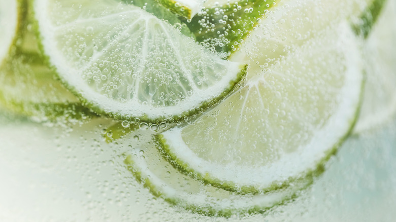 close-up limes in soda