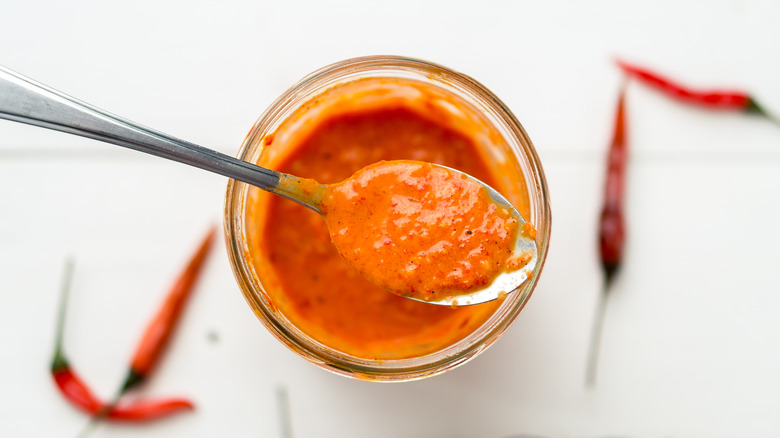 Hot sauce on a spoon