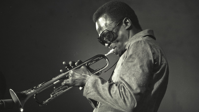 Miles Davis playing trumpet