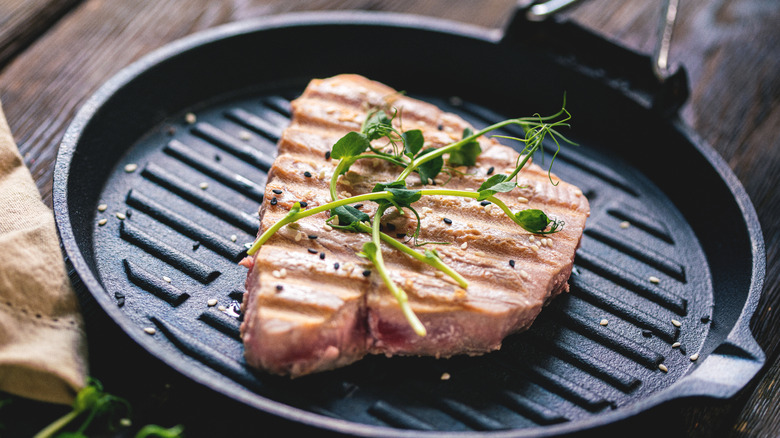 Tuna steak in pan