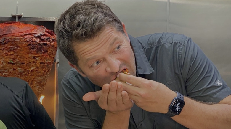 Collins eating taco