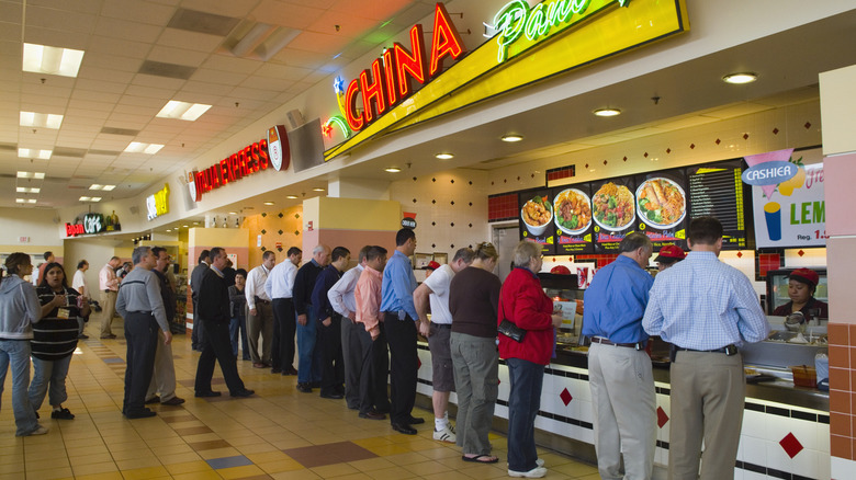 People queuing at mall food court