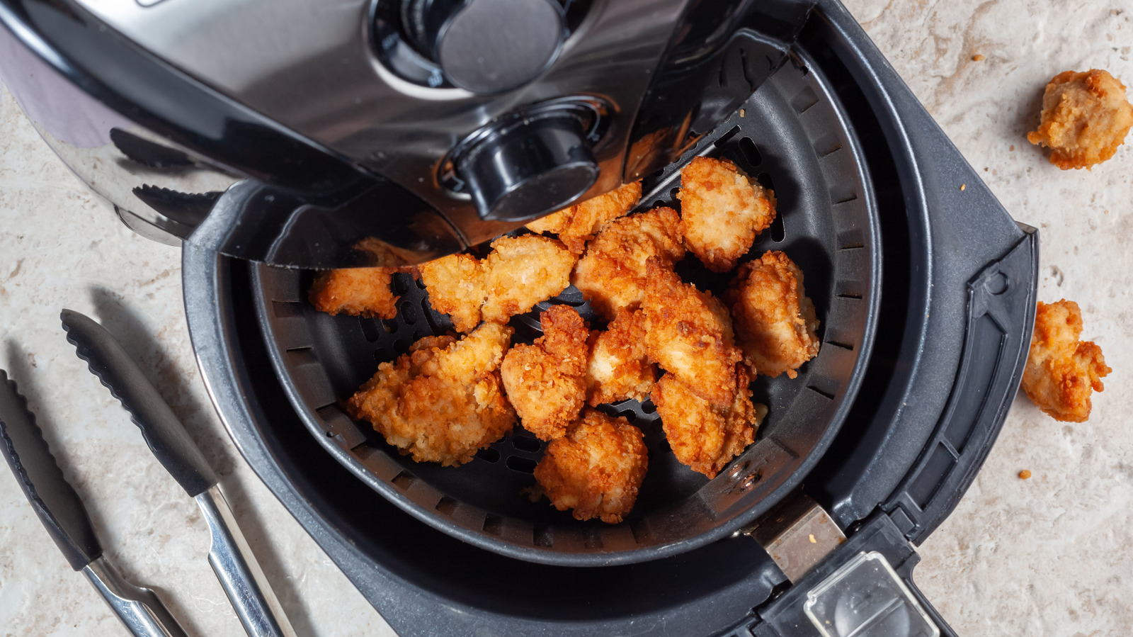 Mistakes Everyone Makes Cooking Fried Chicken In The Air Fryer
