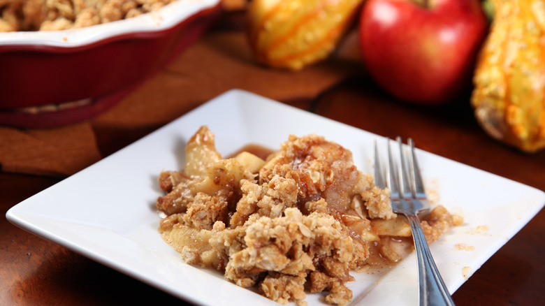 Apple crisp on white plate