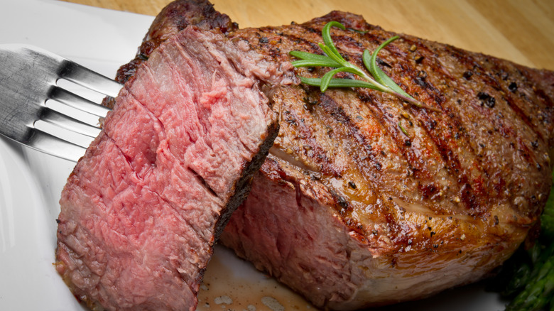 cut steak on fork