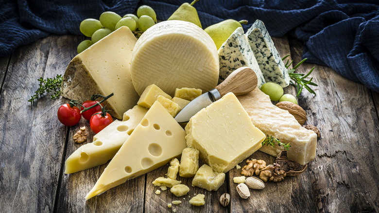 selection of cheeses on table