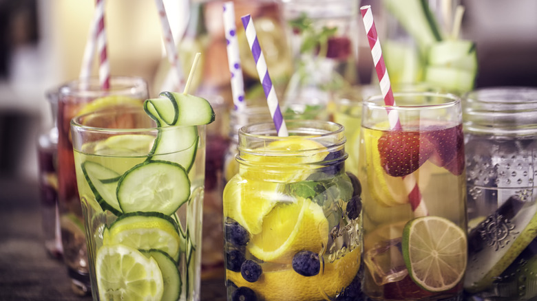 Glasses of liquor with fruit pieces