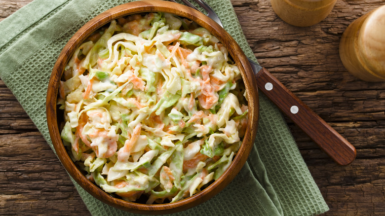 Coleslaw in a wooden bowl