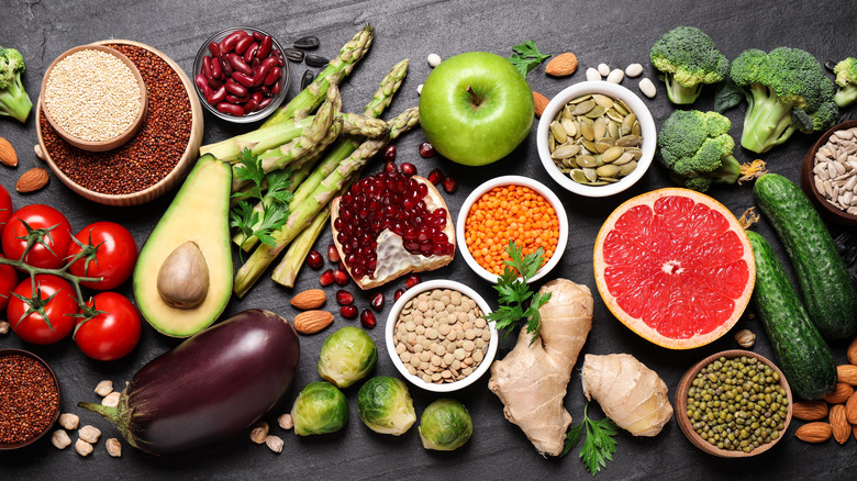 fruits vegetables on black background