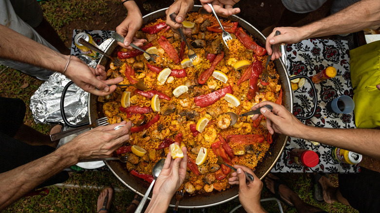 Paella being shared