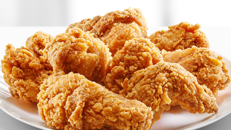 Fried chicken nuggets on a yellow background