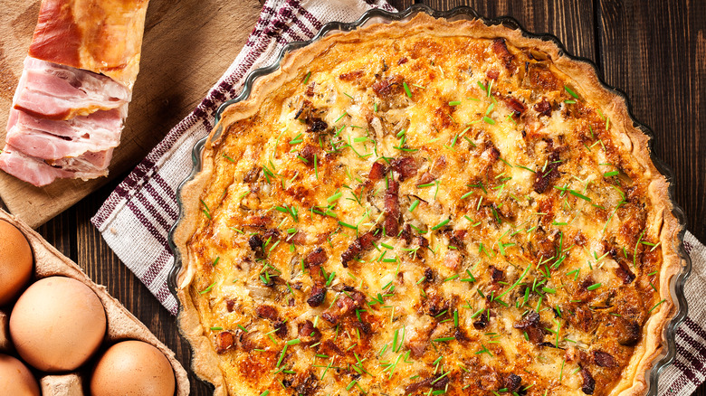 Baked quiche on table