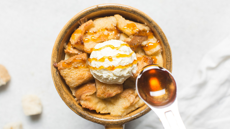 Bread pudding served with vanilla ice cream