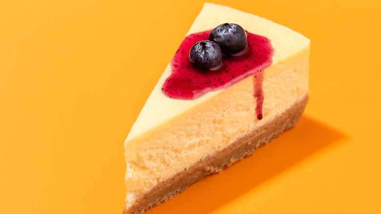 slice of cheesecake with blueberry topping