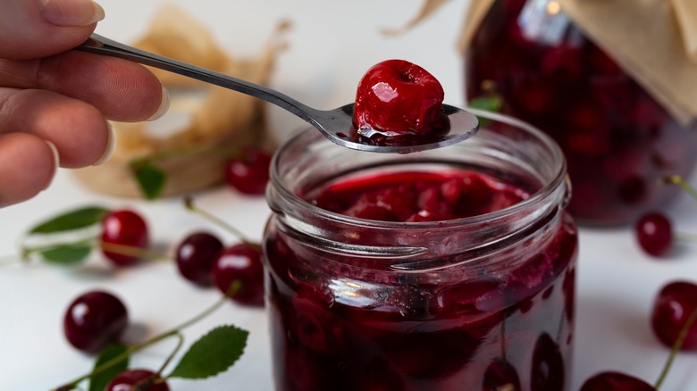 cherries and cherry jamwith spoon