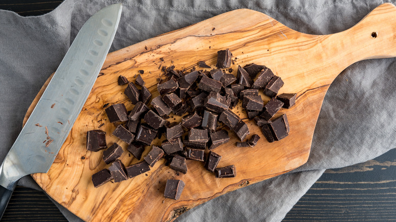 Chopped chocolate on cutting board