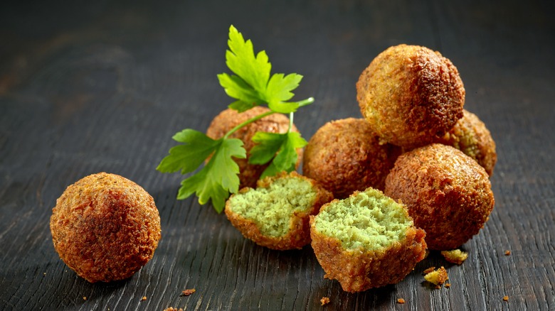 falafel balls on wooden table