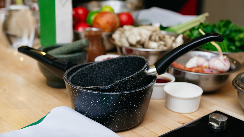 nonstick saucepans on kitchen counter