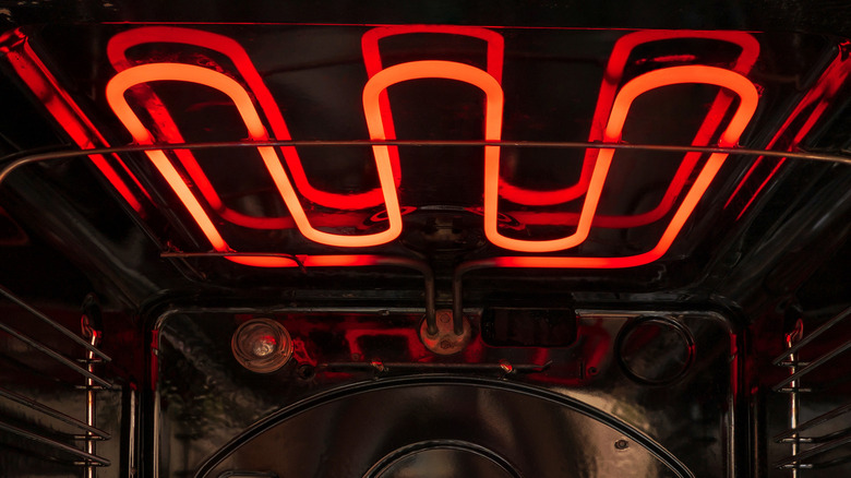 hot heating element at top of oven