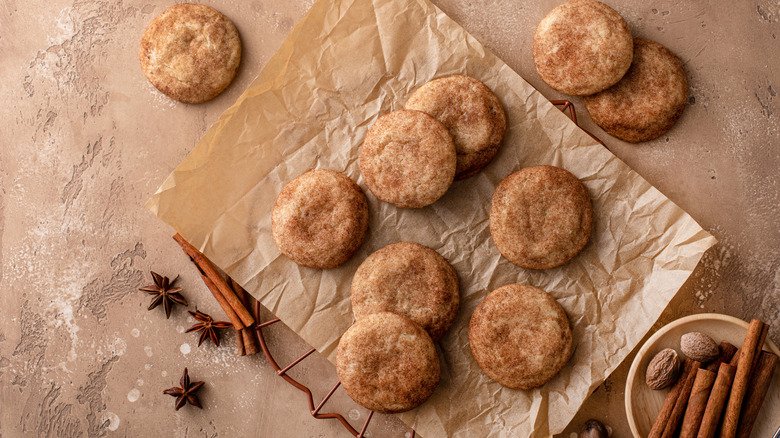 Overhead view of batch of snickerdoodles and spices