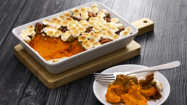 Sweet potato casserole loaded with pecans and marshmallows