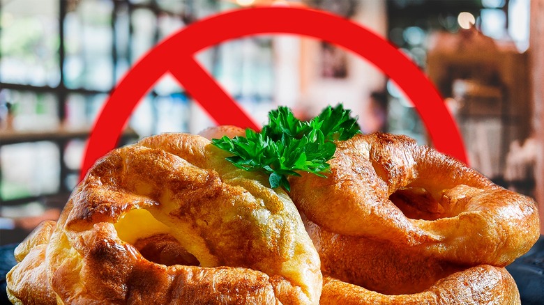 Yorkshire puddings with red banned sign behind it