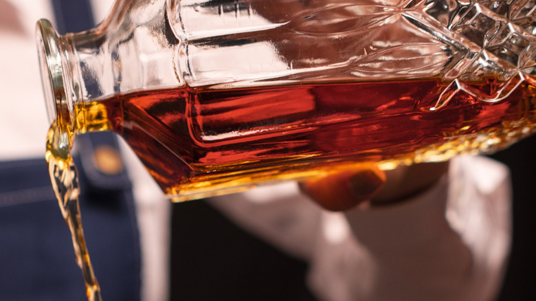 Bourbon pouring from decanter