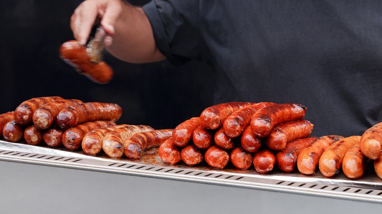 Stack of hot dogs and sausages