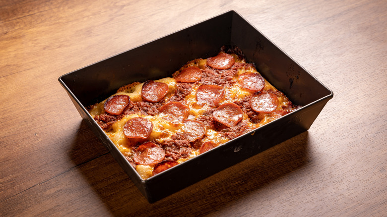 Detroit-style pizza in pan