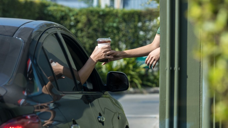 Getting coffee at drive thru
