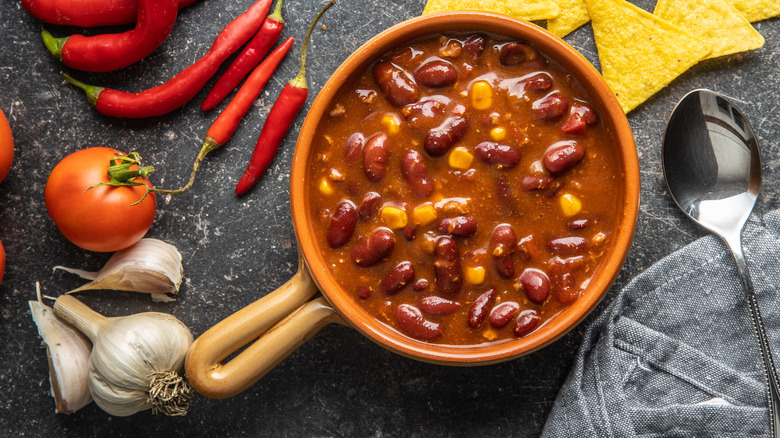 bowl of chili with fresh garlic