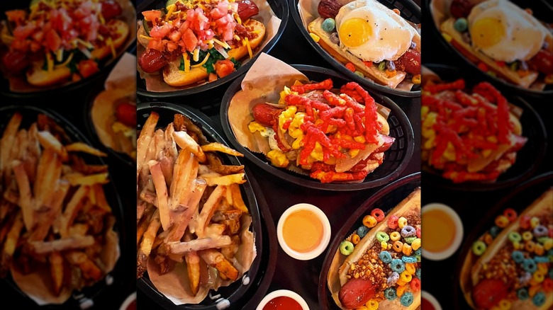 Hot dogs from Happy Dog loaded with vibrant toppings