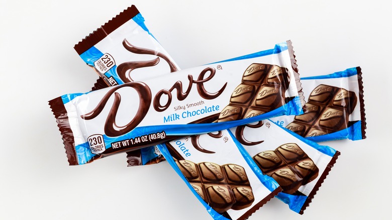 Dove chocolate bars on a white background