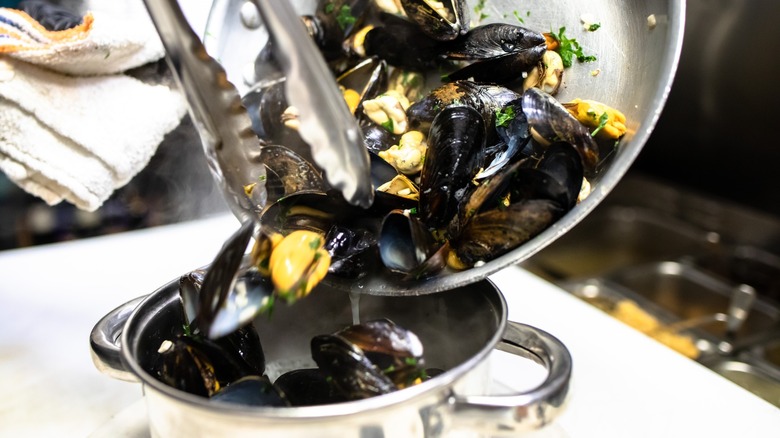 Fresh mussels being prepared in the Monk's Cafe kitchen in Philadelphia, PA.