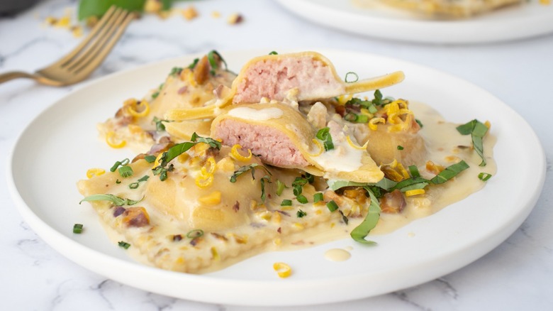 mortadella ravioli with pistachio cream sauce