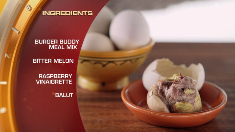 Peeled balut egg in bowl