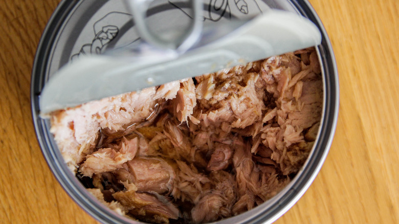 Partially open can of tuna