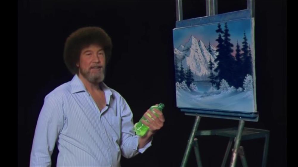 Bob Ross with painting and Mountain Dew bottle