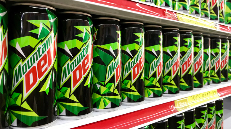 Mountain Dew cans on a shelf