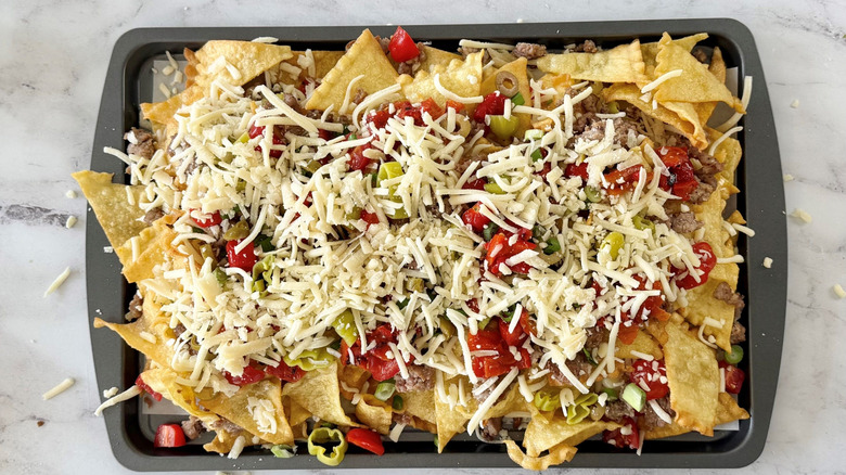 Italian nachos on baking sheet