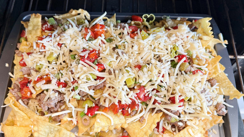 Platter of Italian nachos going into oven