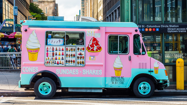 A pink and blue ice cream truck