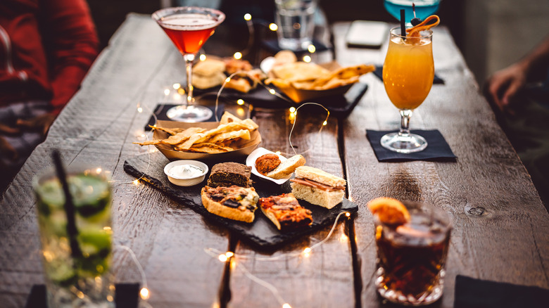 Drinks and bar food on table