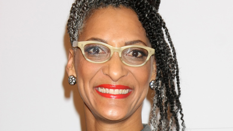 Carla Hall smiling at an event