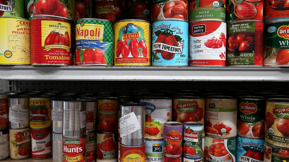 rows of canned tomato pulp