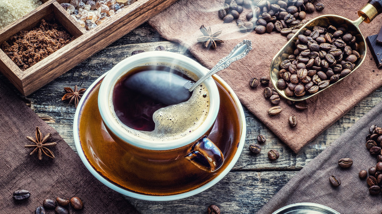 fresh coffee cup with beans