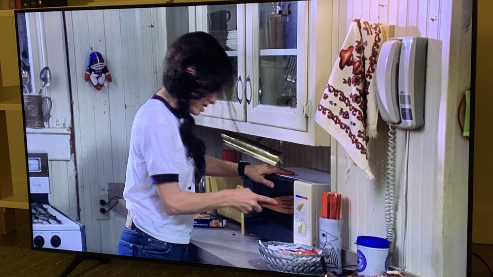 sandra bullock uses spoon for microwave