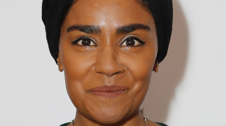 Nadiya Hussain smiling at an event