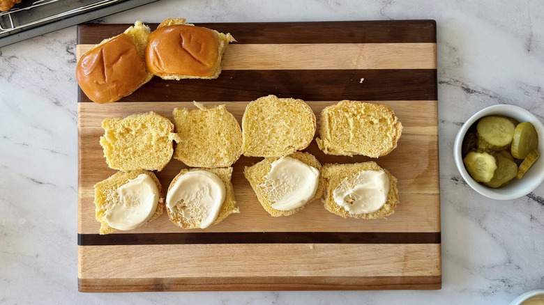 Slider rolls on wooden board